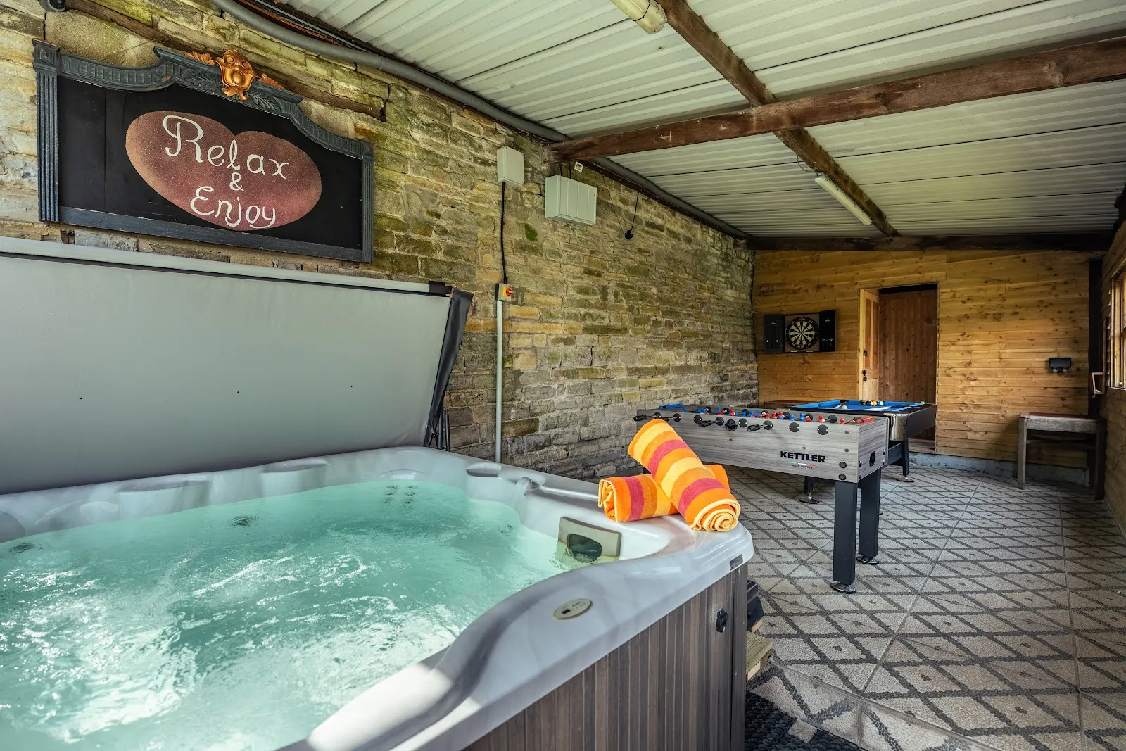 The private covered hot tub at The Threshing Barn.