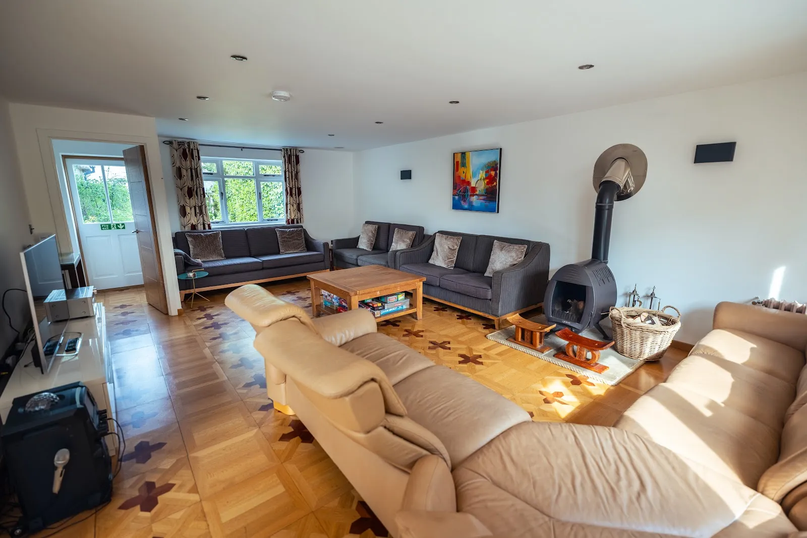 The lounge at Upton Bourn Lodge, with space for the whole group to relax together