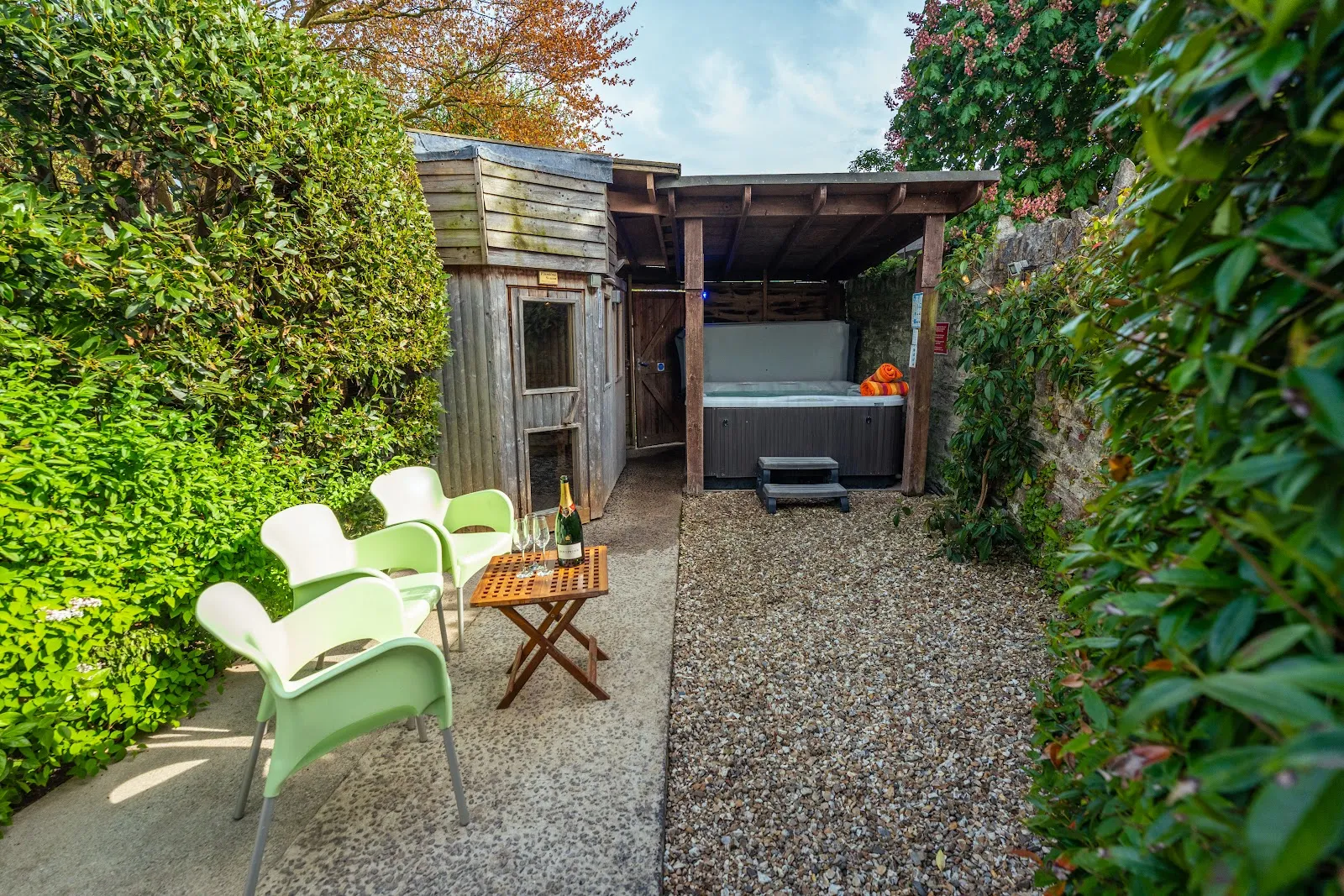 The private outdoor hot tub at Upton Bourn Lodge, a group holiday house sleeping up to 23 in Long Sutton, Somerset