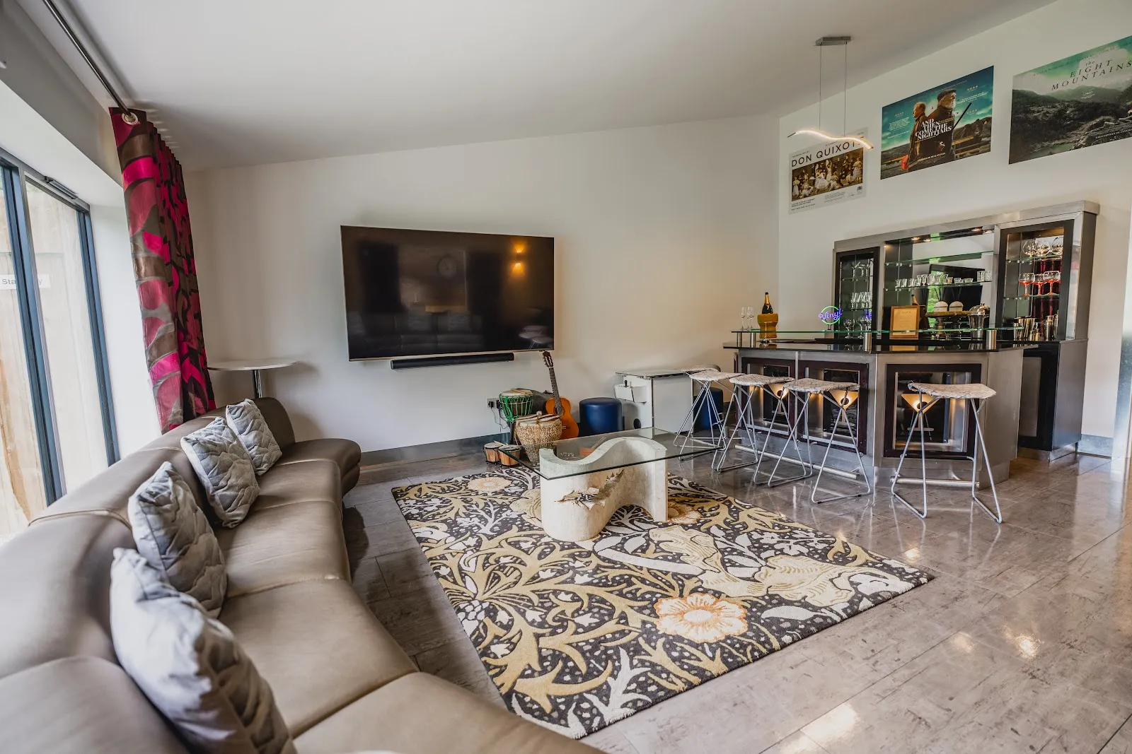 The private cinema, karaoke and bar lounge at Vedalworks, a group holiday house sleeping up to 24 in Long Sutton, Somerset