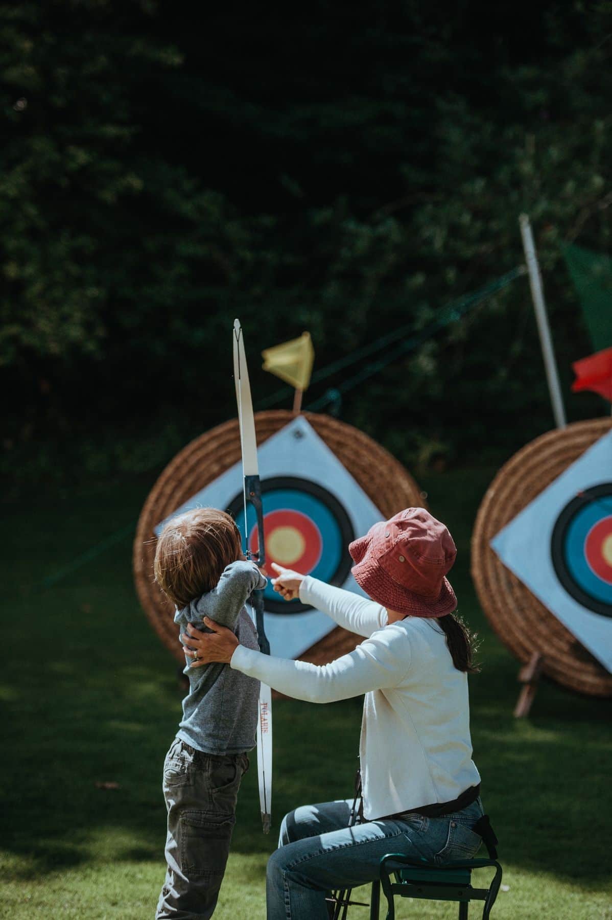 Guests trying archery on the lawn
